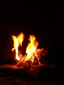Flame leaps joyfully through the sticks 